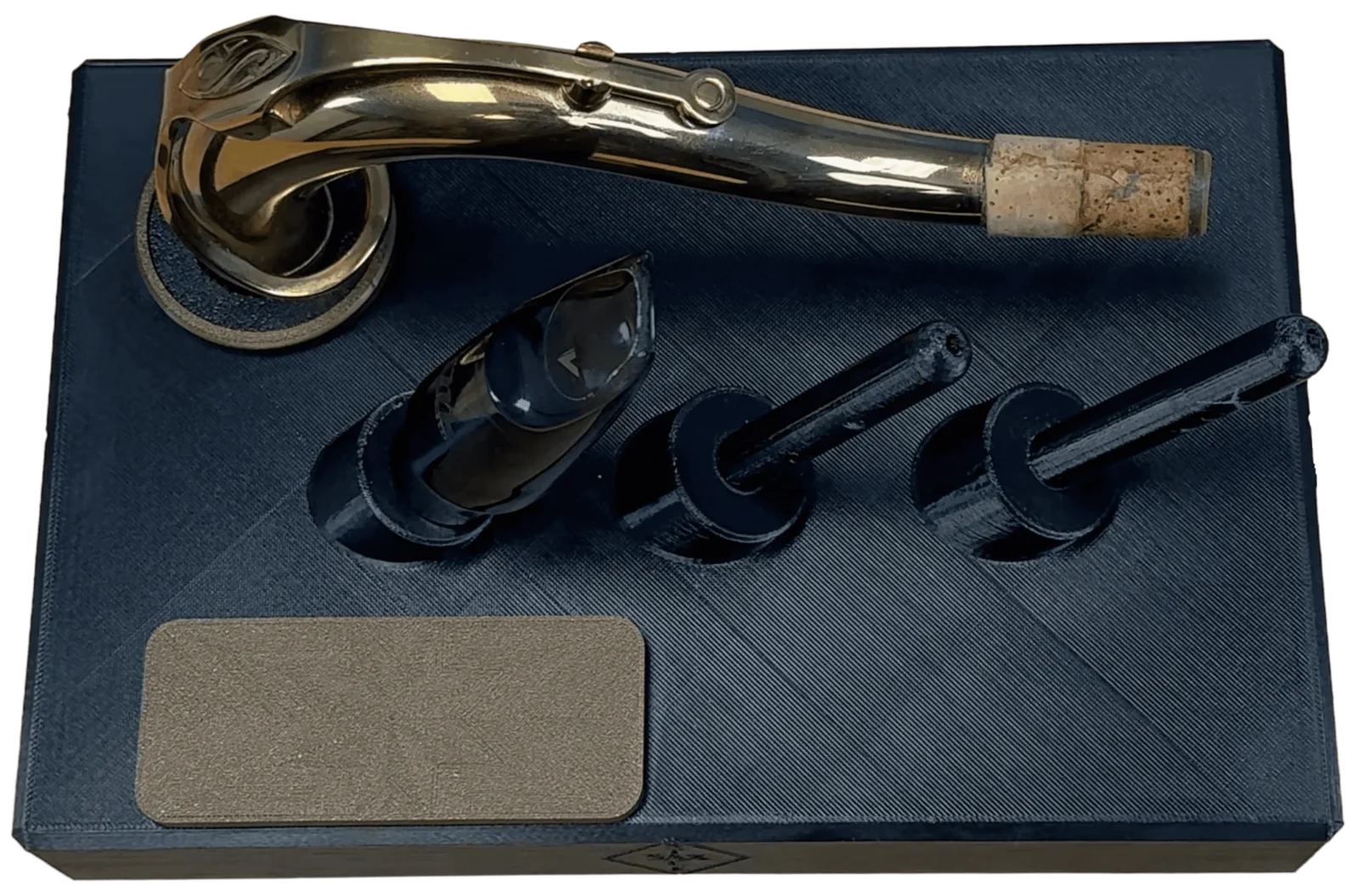 The 3D-printed Sax Stack holding a saxophone neck, a mouthpiece, and two accessory posts