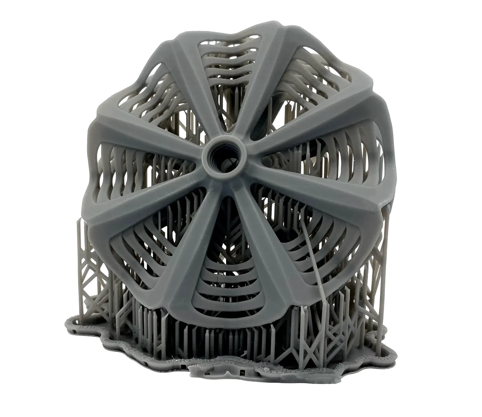 Grey 3D-printed part in ABS-like resin still attached to its printed support structures